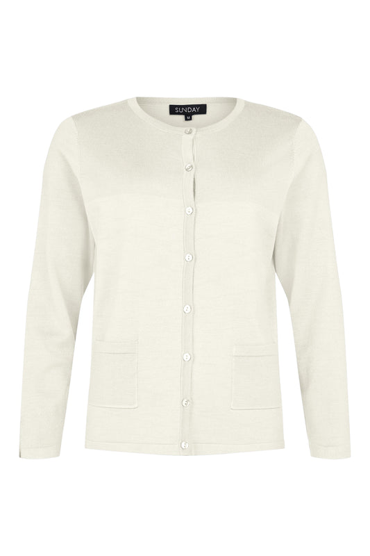 The Cardigan 6455 SUNDAY is a light green, long-sleeved piece featuring a crew neck, white buttons down the front, and two pockets. The "SUNDAY" label at the collar stands out against its plain white background for an elegant touch.