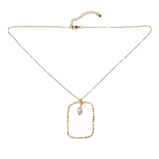 The Suzie Blue Hammered Rectangle With Pearl Pendant In Gold Plate is a delicate gold plate necklace featuring a fine chain and a rectangular pendant with a hammered texture. Inside the open rectangle hangs a single white pearl. This handmade necklace, crafted with ethically sourced materials, includes an adjustable clasp closure.