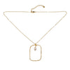 The Suzie Blue Hammered Rectangle With Pearl Pendant In Gold Plate is a delicate gold plate necklace featuring a fine chain and a rectangular pendant with a hammered texture. Inside the open rectangle hangs a single white pearl. This handmade necklace, crafted with ethically sourced materials, includes an adjustable clasp closure.