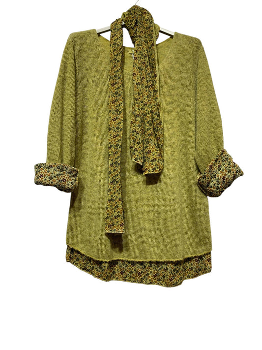 The LINEN & COTTON HOUSE “Tunic with scarf 1111 VINTAGE: OLIVE” features a light olive-green long-sleeve tunic adorned with vintage-inspired floral accents on the cuffs and hem, complemented by a matching floral scarf. Both pieces are tastefully showcased on a hanger against a white background.