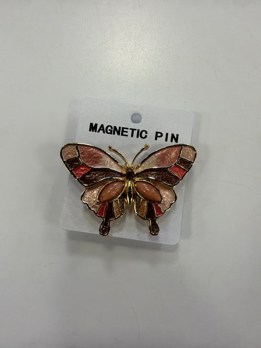 Denise 15 Brooch by Elise accessories, a butterfly-shaped magnetic brooch with gold trim and pink, brown, and orange enamel inlay on a display card.