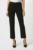 A person wearing Joseph Ribkoff’s Gia | Classic Slim Fit Stretch Jeans 251966B25, a white top, and black pointed-toe heels stands against a plain white background with only the lower half of their body visible.