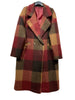 Introducing the 50706 FALL WINTER CLOTHING COAT in Bordeaux by LINEN & COTTON HOUSE—a long wool blend coat showcasing a bold large plaid pattern in striking red, brown, yellow, and orange tones. Thoughtfully designed with wide lapels, two side pockets, a single button closure, and finished with a pinkish inner lining, this coat offers both warmth and standout style for your fall-winter wardrobe.