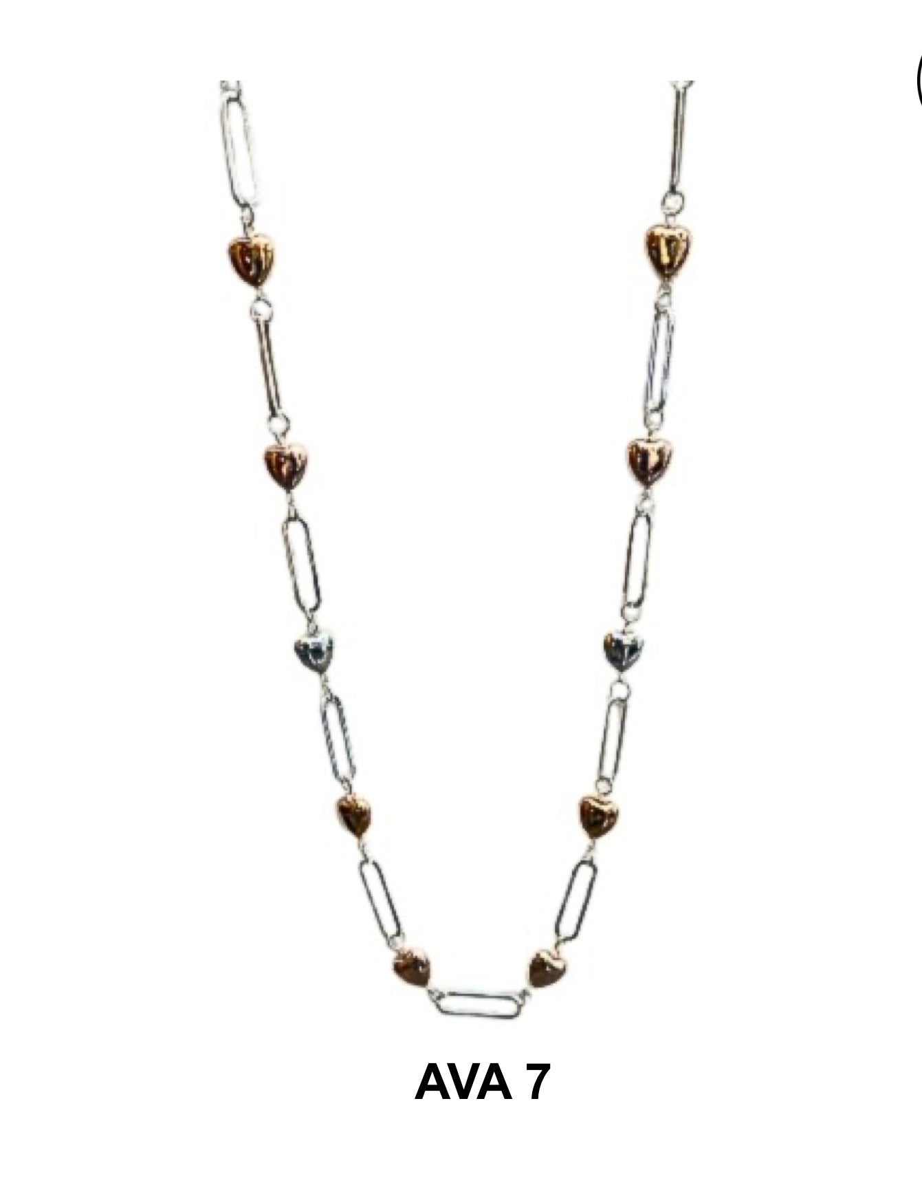 The Ava 7 Silver RLD Necklace by Elise accessories features alternating gold and silver heart-shaped beads with elongated chain links, shown on a white background. "AVA 7" is displayed below this elegant piece by Elise accessories.
