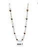 The Ava 7 Silver RLD Necklace by Elise accessories features alternating gold and silver heart-shaped beads with elongated chain links, shown on a white background. "AVA 7" is displayed below this elegant piece by Elise accessories.