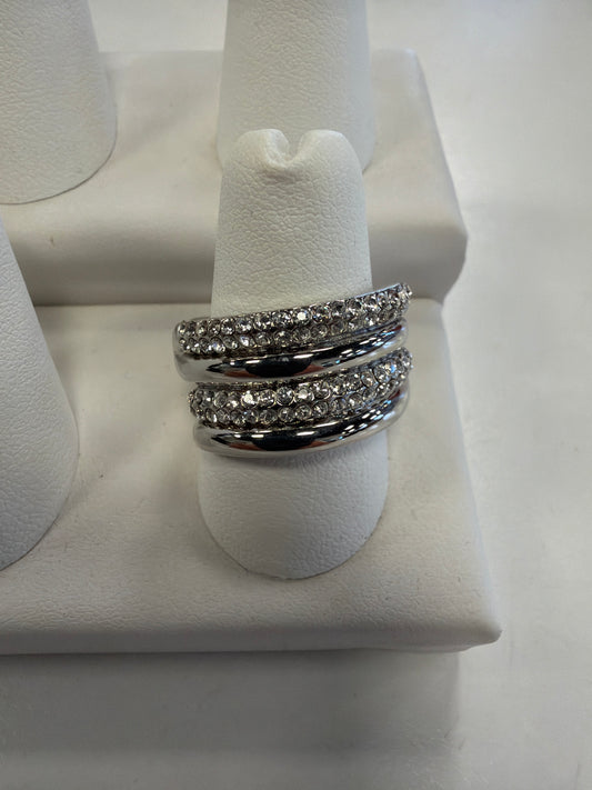 Jenna 76 Ring, a wide silver band featuring two rows of inlaid crystals separated by a polished metal center.