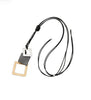 The Sofia 30 Necklace by Elise Accessories is a modern two-tone pendant necklace with a black cord and three overlapping geometric pendants—silver, black leather, and gold squares—for a bold statement look.