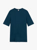 The Toma Tee 2nd Skin - REFLECTING POND, a plain dark blue T-shirt showcased from the back against a white background, features short sleeves and no visible logos or patterns. Crafted from breathable fabric, this essential piece by Once We Were Warriors ensures comfort and style effortlessly.