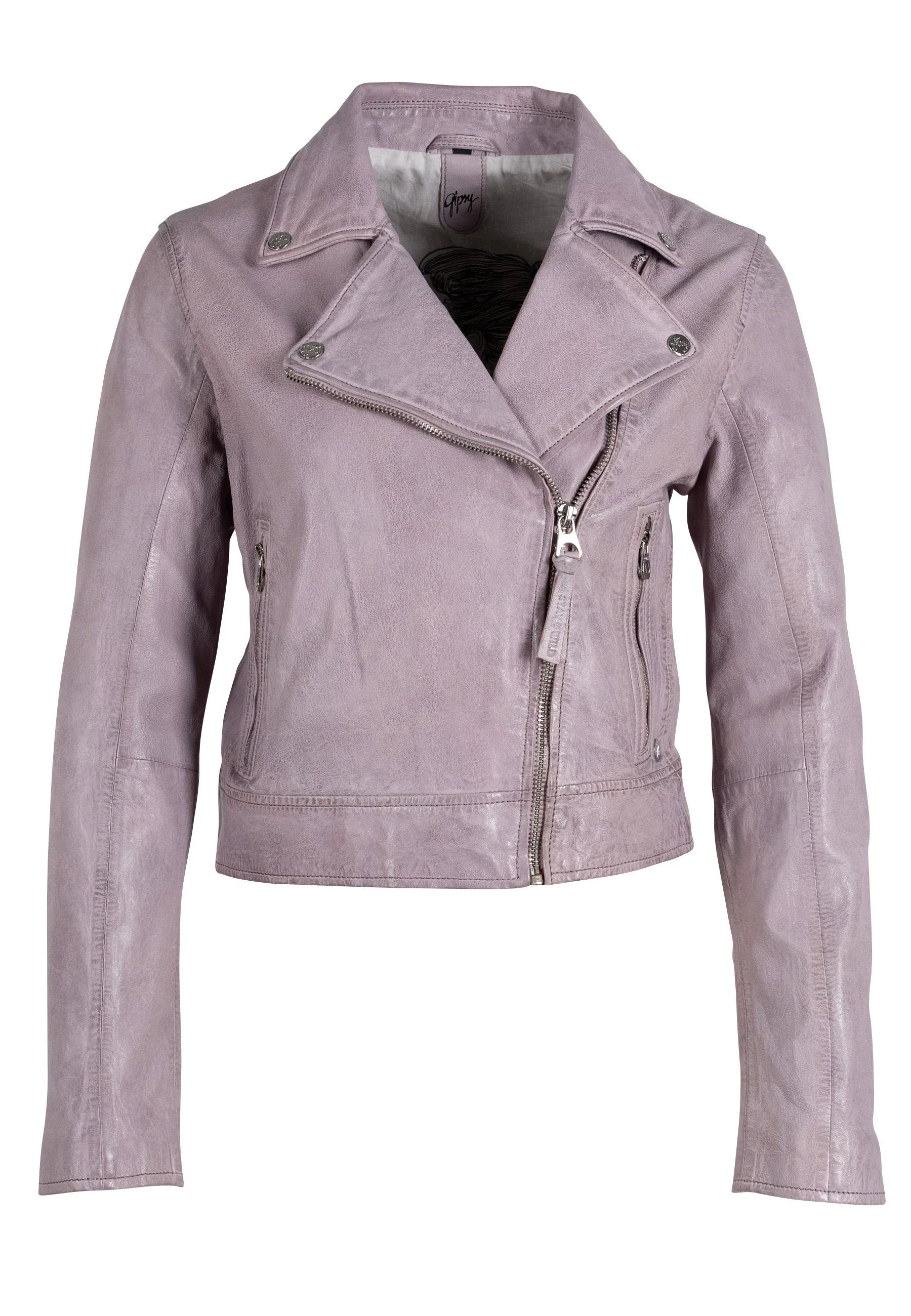 A person with short hair stands confidently on a city street, wearing the chic Julene RF Leather Jacket in Light Lavender from MAURITIUS LEATHER, along with a black crop top and high-waisted jeans that offer a flattering fit. Tall buildings and urban scenery form the blurred background.