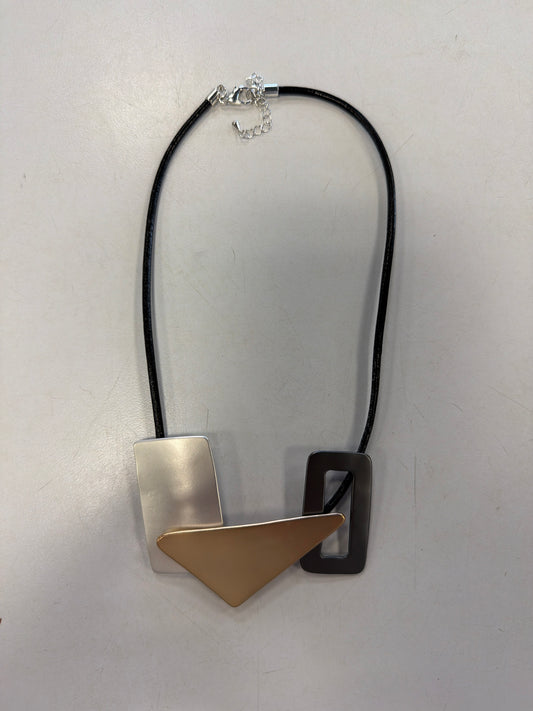 Roxanne 53 Necklace by Elise accessories featuring a geometric design on a thin black cord with three charms in silver, gold, and dark grey for everyday wear.