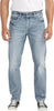 A person wearing light blue Eddie Athletic Fit Tapered Leg Jeans from Silver Jeans Co. and a white t-shirt is shown from the chest down. The jeans, in a light indigo wash, have a faded, slightly distressed look with subtle whiskering on the thighs. They are paired with black and white sneakers. The person is standing against a plain background.