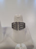 A silver adjustable ring, adorned with three rows of sparkling diamonds on a white display stand. The ring is elegant, showcasing the diamonds' brilliance and the intricate design of the setting. The background is plain and softly blurred. Kristin-40 from Elise Accessories brings timeless beauty to your collection.