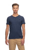 A man with short brown hair is wearing a beige pair of pants and a plain navy blue V-neck t-shirt from RAGWEAR's VENIE collection. He stands facing the camera against a plain white background, with a neutral expression and his arms relaxed by his sides.