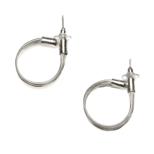 Two metallic needle threaders featuring circular wire loops and small handles at the base, reminiscent of the Wire Loop Metal Earrings by Suzie Blue. The loops, connected to a thin pin, exhibit a straightforward and functional design. These nickel-free plated brass tools are displayed on a white background in silver color.