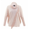 The Marble Long Sleeve Knit 6373 by MARBLE is a stylish, light pink, 100% cotton sweater that features a cowl neck and a diagonal fringe detail running from the left shoulder to the right waist. With ribbed sleeves from the elbow down, it offers a loose, relaxed fit.