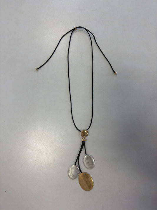 Elise accessories Sofia 31 Necklace featuring an adjustable cord with three two-tone silver and gold pendants.