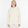 A person with straight blonde hair wears a cozy, off-white COLBIE CORDY Sweatshirt by RAGWEAR with matching pants, standing against a plain white background and smiling gently at the camera.