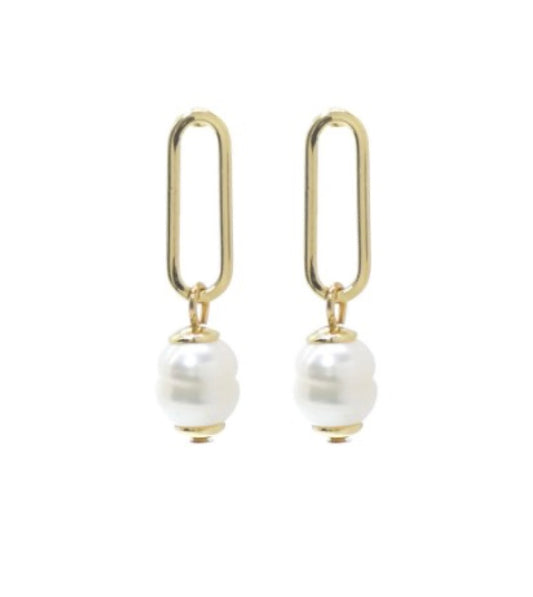 Dana 92 Gold Earrings by Elise Accessories: gold paperclip earrings with a single round white pearl dangling at the bottom, shown against a white background.