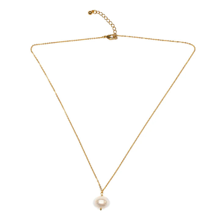 The Single Pearl Drop Necklace - Gold Plate by Suzie Blue features a delicate gold-plated chain with a single pearl drop pendant. This handmade piece includes an adjustable clasp for customizable length, allowing the simple and elegant design to truly highlight the pearl as the focal point.