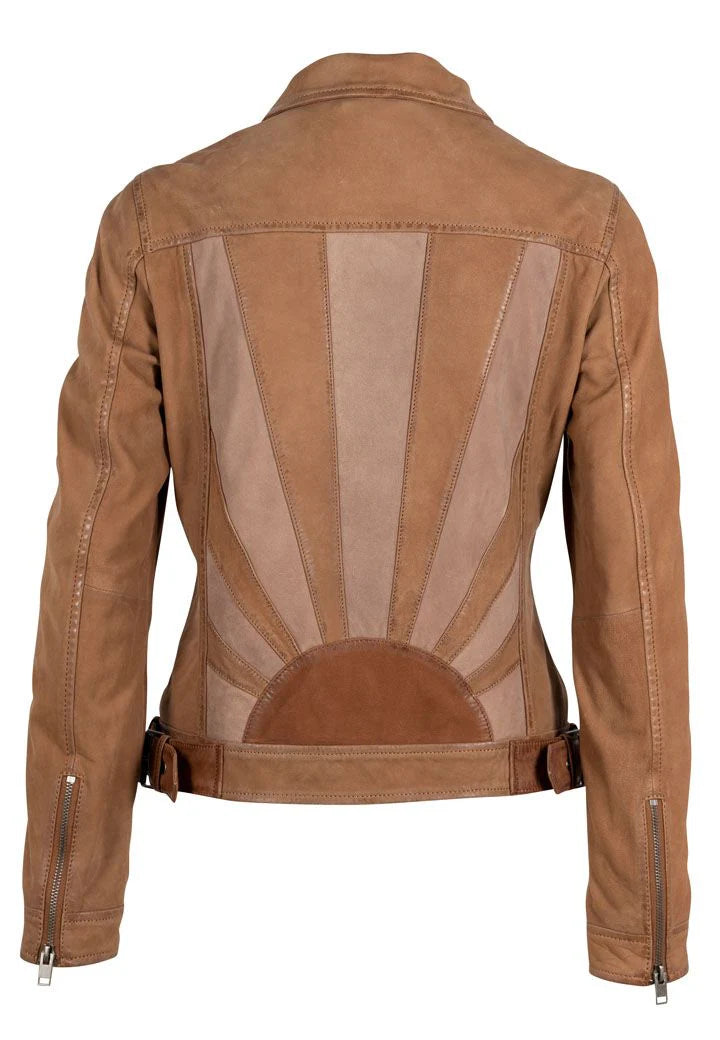 A person with shoulder-length brown hair faces away from the camera, wearing the Sunny RF Leather Jacket in cognac by MAURITIUS LEATHER, which showcases varying shades of tan and brown with a sunset design featuring rays emanating from a circular center at the bottom.