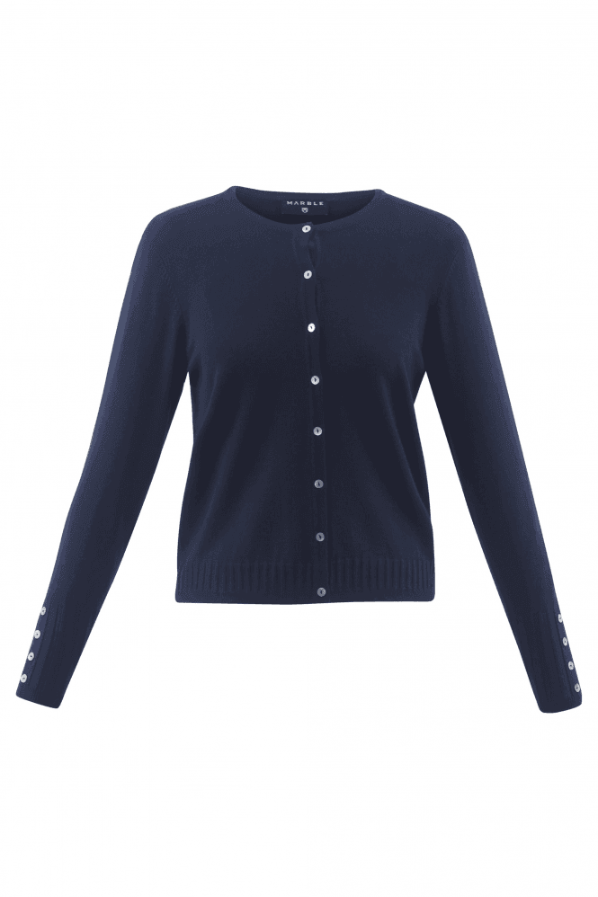 The Joseph Ribkoff Fine Knit Ribbed Detail Cardigan in navy features a long-sleeve design with a round neckline and button-down front. This stylish cardigan is adorned with ribbed details on the cuffs and hem, as well as additional buttons on the cuffs for an extra touch of elegance. The soft material ensures comfort, making it perfect for both casual and semi-formal occasions.