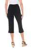 A person is wearing versatile black capri pants from Bali Corp with a white top and wedge sandals. The photo is taken from behind, showcasing the women's Womans Black Pants which have decorative buttons and small slits on the sides near the hem.