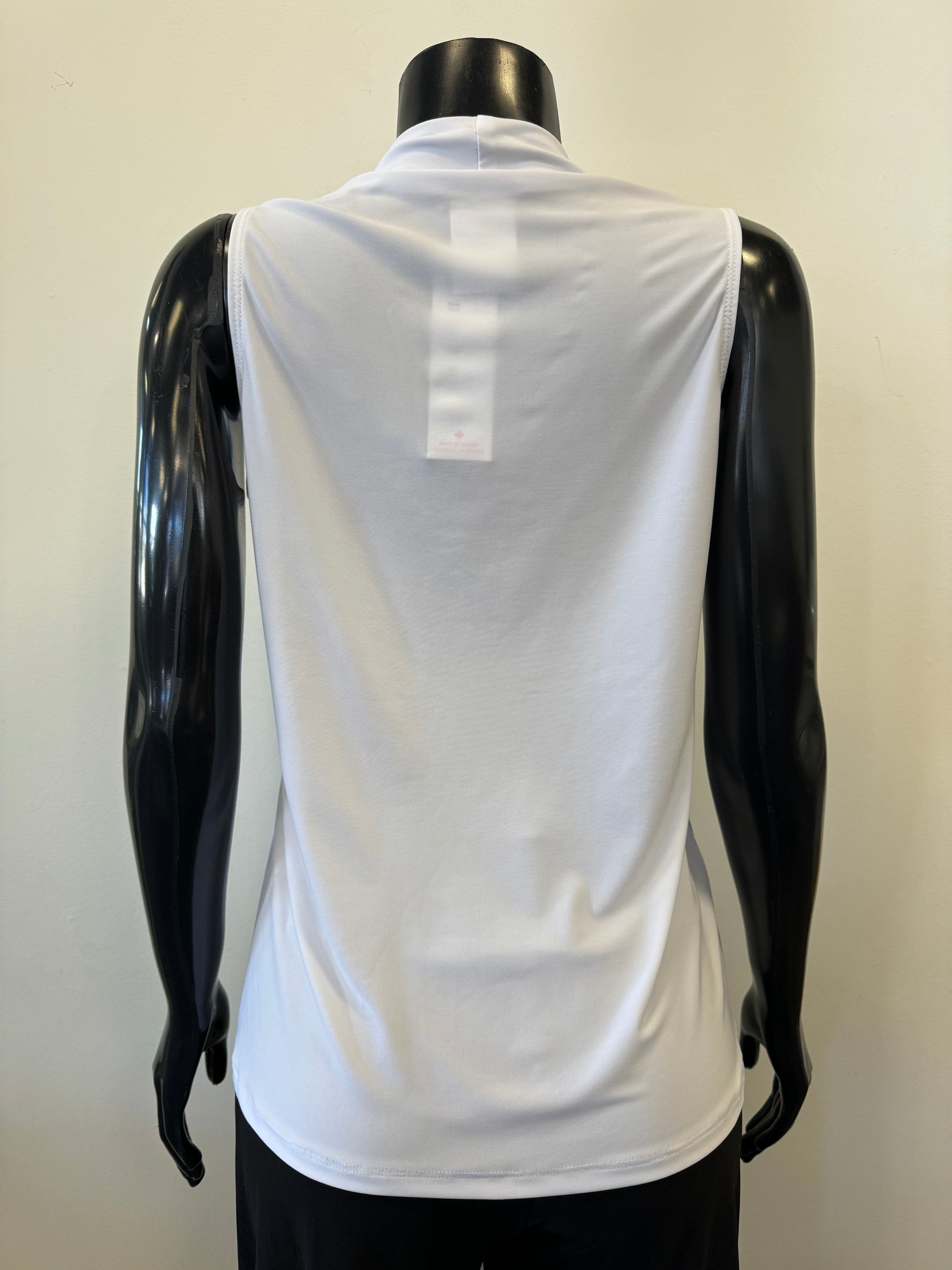 A black mannequin displays a sleeveless, deep V-neck, navy blue Bali Corp Bali Top Sleeveless 8326 paired with black trousers. The versatile top is made in Canada and stands out against the plain, white background.