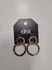 Dana 84 Earrings by Elise accessories showcase gold double hoops—one small, one larger and textured—presented on a black "elise" display card against a white surface, reflecting refined elegance.