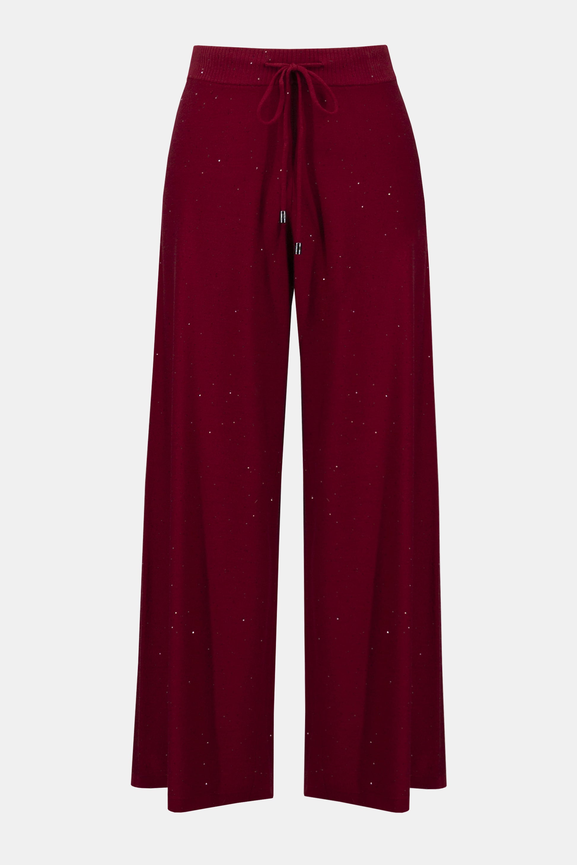 Joseph Ribkoff Sequined Sweater Knit Culotte Pants 244922F25 feature a wide-leg silhouette, elastic waistband with drawstring, and subtle sparkly speckles throughout the maroon sequin sweater knit fabric.