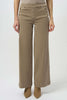 A person wearing Joseph Ribkoff Classic Wide Leg Pull-On Jeans 254919, featuring button-detailed pockets, styled with tan pointed-toe shoes. Image is cropped from the shoulders down.