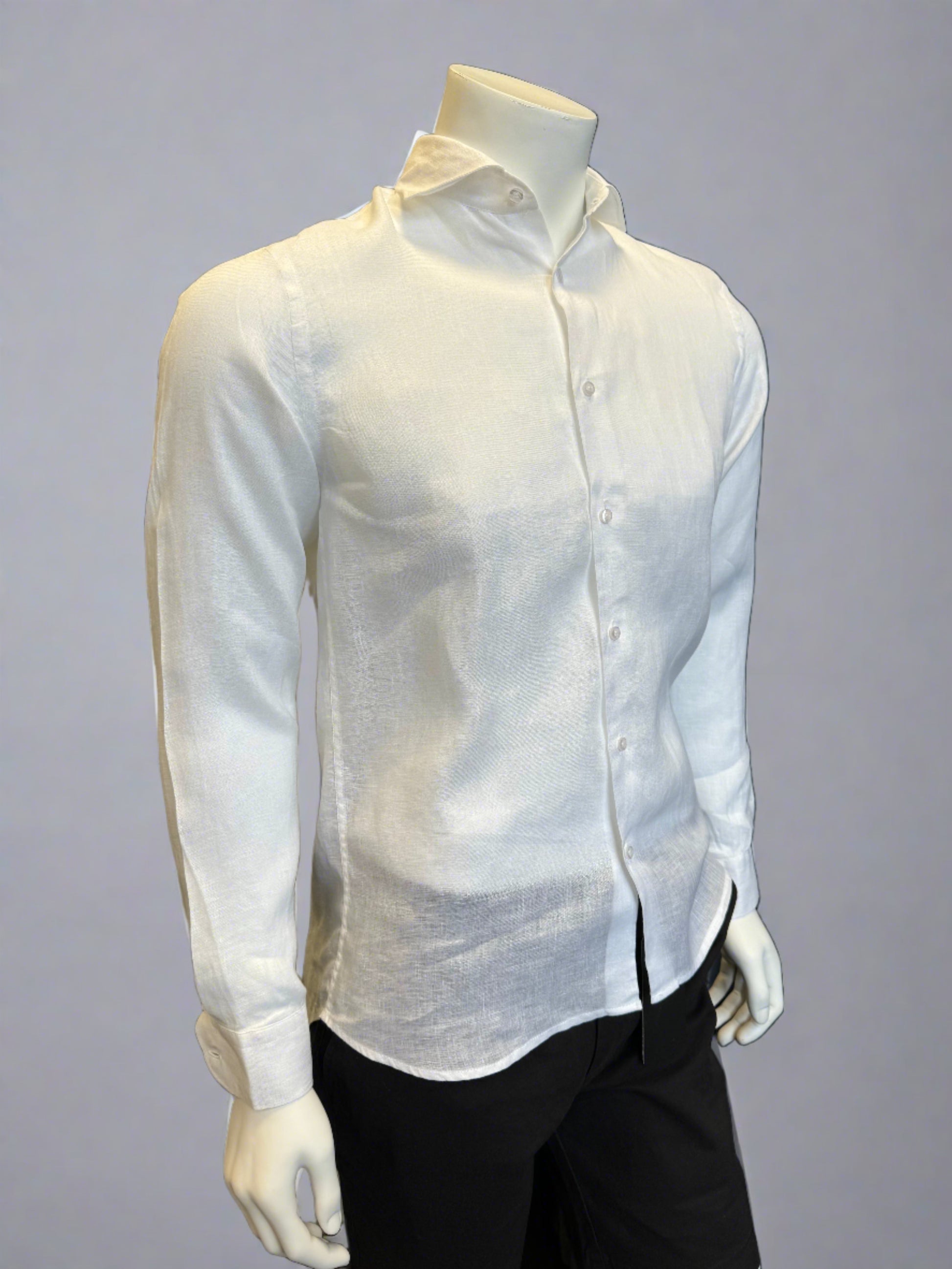 A headless mannequin dressed in a crisp white Paul Miranda Linen Shirt Bianco and black trousers, positioned against a plain grey background. Made in Italy, the shirt by Paul Miranda is neatly tucked in, highlighting a classic, formal look.