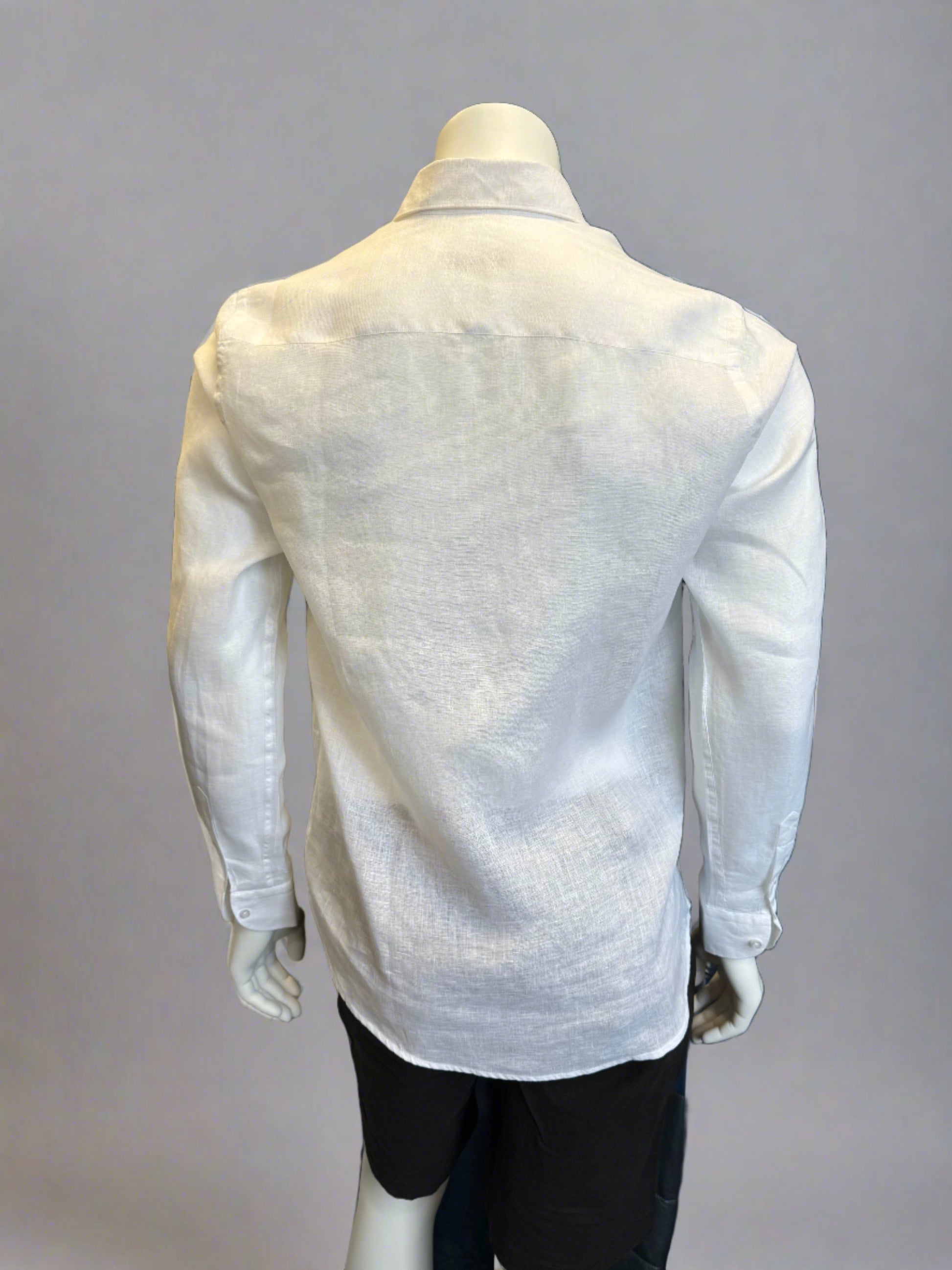 A headless mannequin dressed in a crisp white Paul Miranda Linen Shirt Bianco and black trousers, positioned against a plain grey background. Made in Italy, the shirt by Paul Miranda is neatly tucked in, highlighting a classic, formal look.