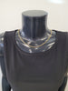 The Rhea-25 Necklace by Elise accessories, a classic gold rope chain crafted from stainless steel, is showcased on a black mannequin in a sleeveless black top, set against a plain light background.