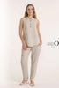 A person wears the French Linen Top TP1495-9 Beige from LinenO, a sleeveless pinstriped top made from 100% European linen, paired with matching pants. White heeled sandals complete the eco-friendly look, set against a light background with "Linen Origins" displayed on the right.