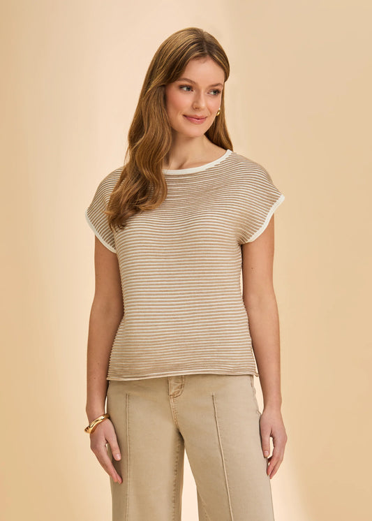 A woman with long, light brown hair smiles softly in the French Dressing Jeans Boatneck Cap Sleeve Sweater in Light Henna, styled against a plain beige background.